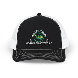 Reel Cool Nephew embroidered trucker cap, front view, black front with white mesh back