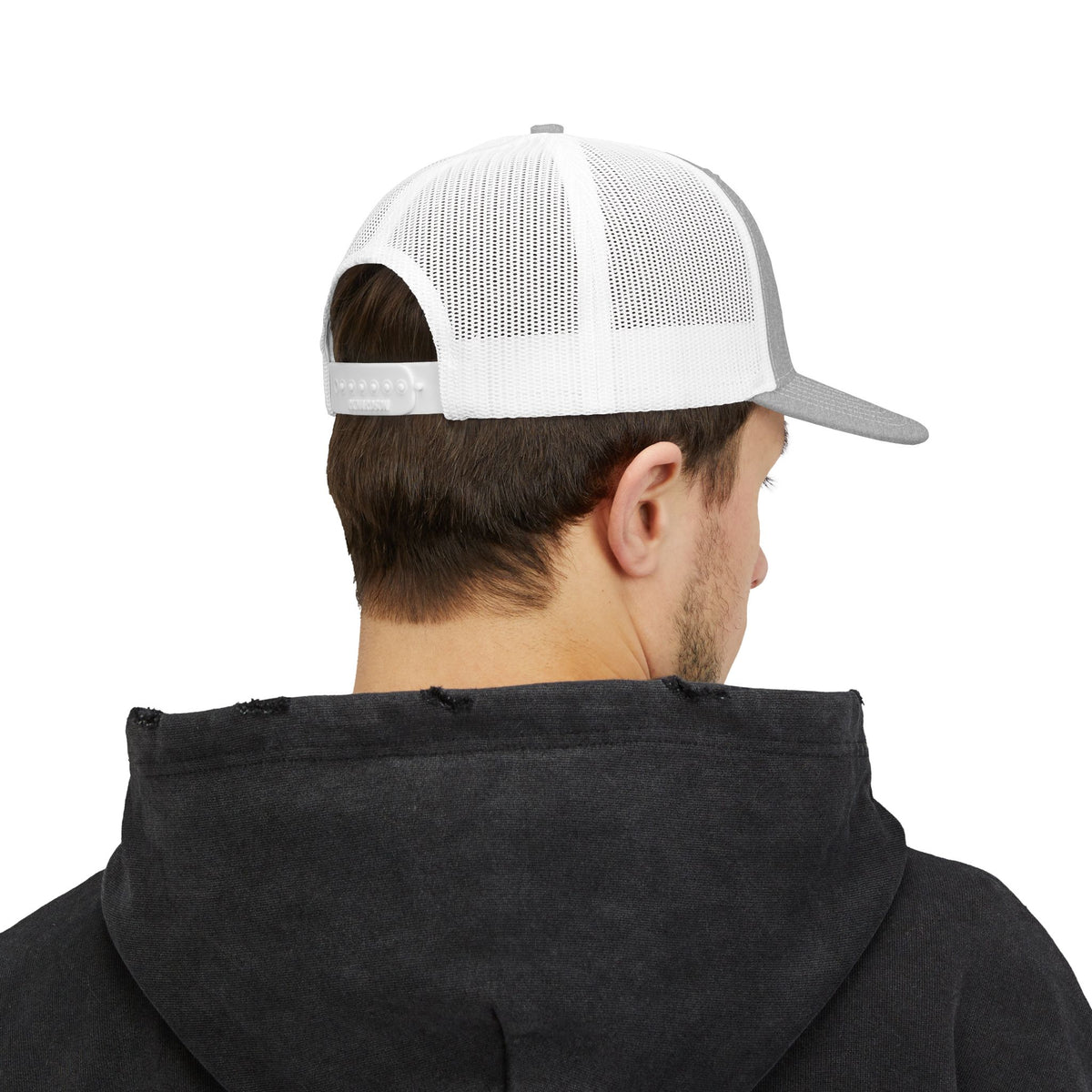 Reel Cool Son embroidered trucker cap on model, back side view, heather grey front with white mesh back